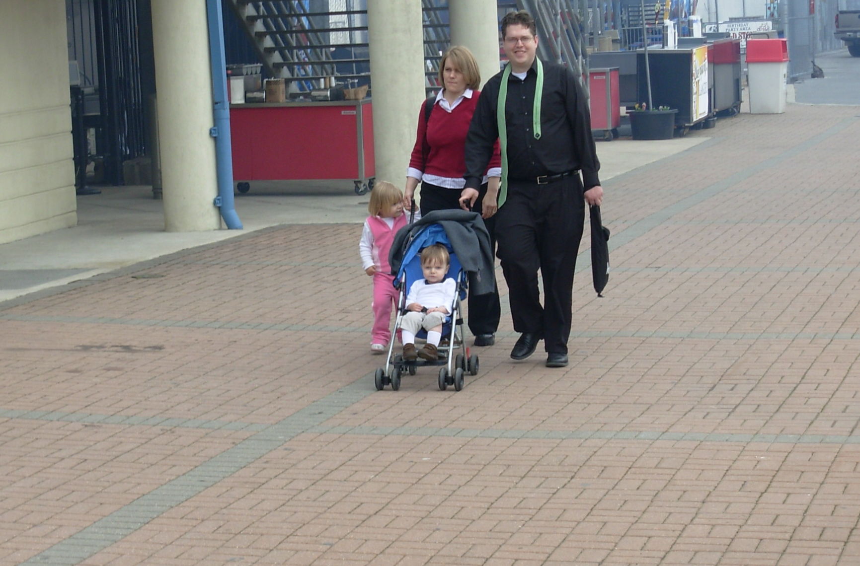 The Brye family arrives at the baseball stadium...
