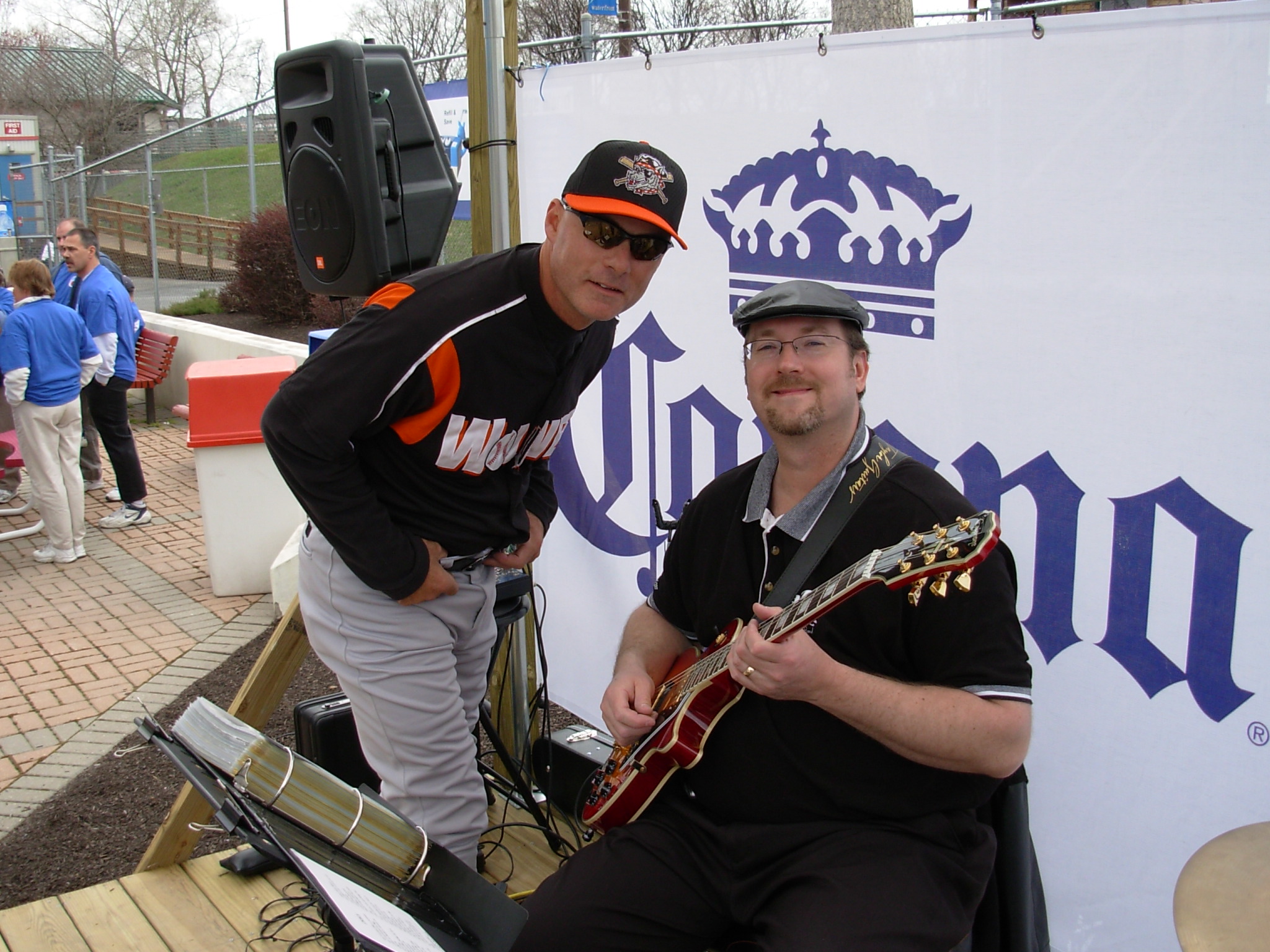 A player from the Erie Seawolves checking out Dougs guitar
