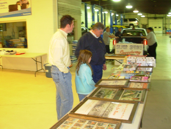 Checking out the items to be auctioned off ...
proceeds benefitted the Eastern Museum of Motor Racing Museum
