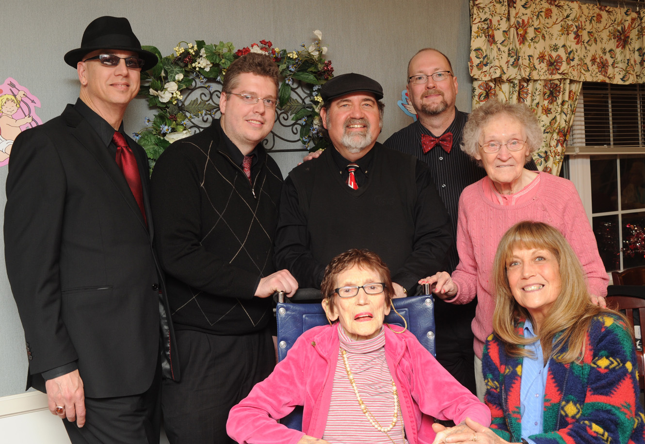 Helen Middleton and daughter with the band at Elmcroft Valentine's Party 2013
