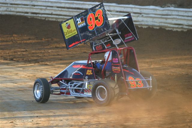 Scott Snyder throwing the dirt in turn three at the Springs
