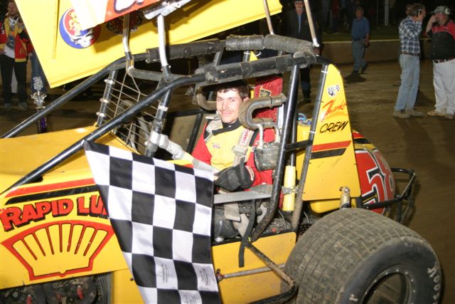 Paul Miller gets the checkered flag
Flags for all divisions provided by Wise Motorsport racing videos
