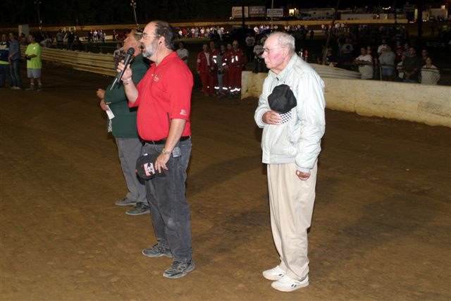 National Anthem
Track announcers Jack Frazier, Kirk Wise, and Tedd Reitz at attention prior to the Sportsman 100
