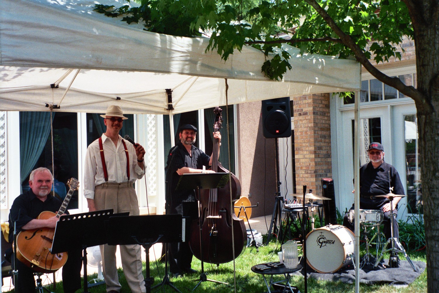 Under the tent at the Masonic Homes
Ron Rhodes on guitar, Mitch, Kirk, and Russel Yohe on drums...

