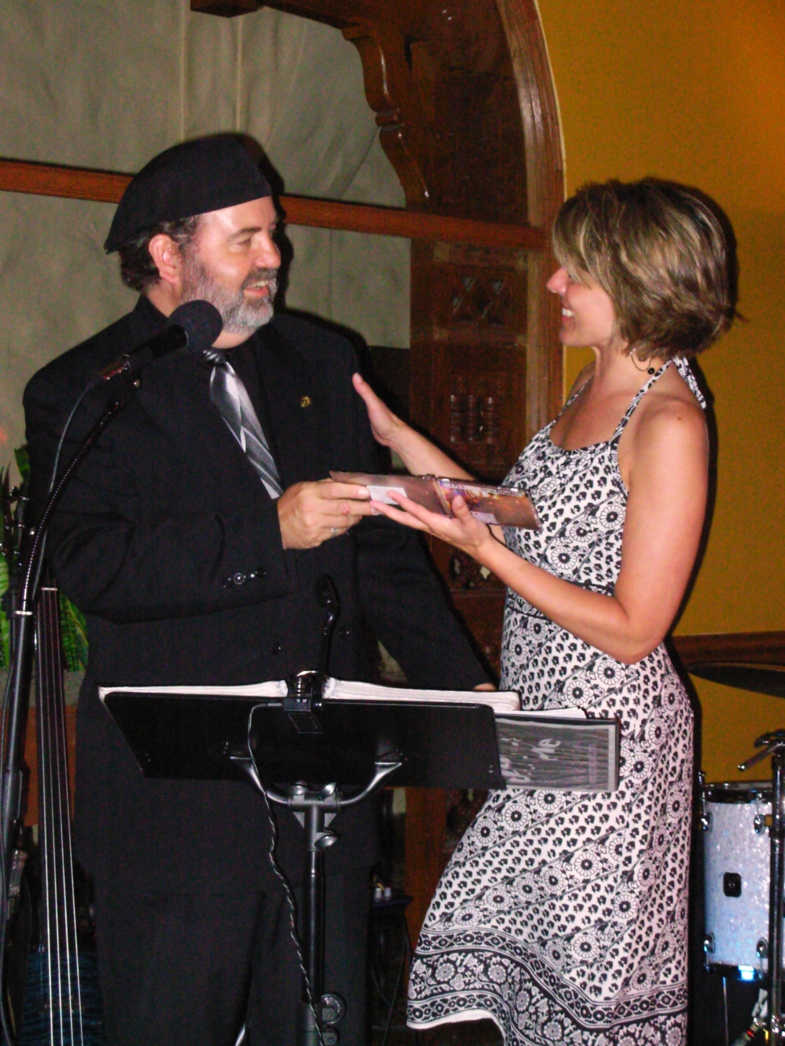 Melissa receives an autographed CD for singing with the band

