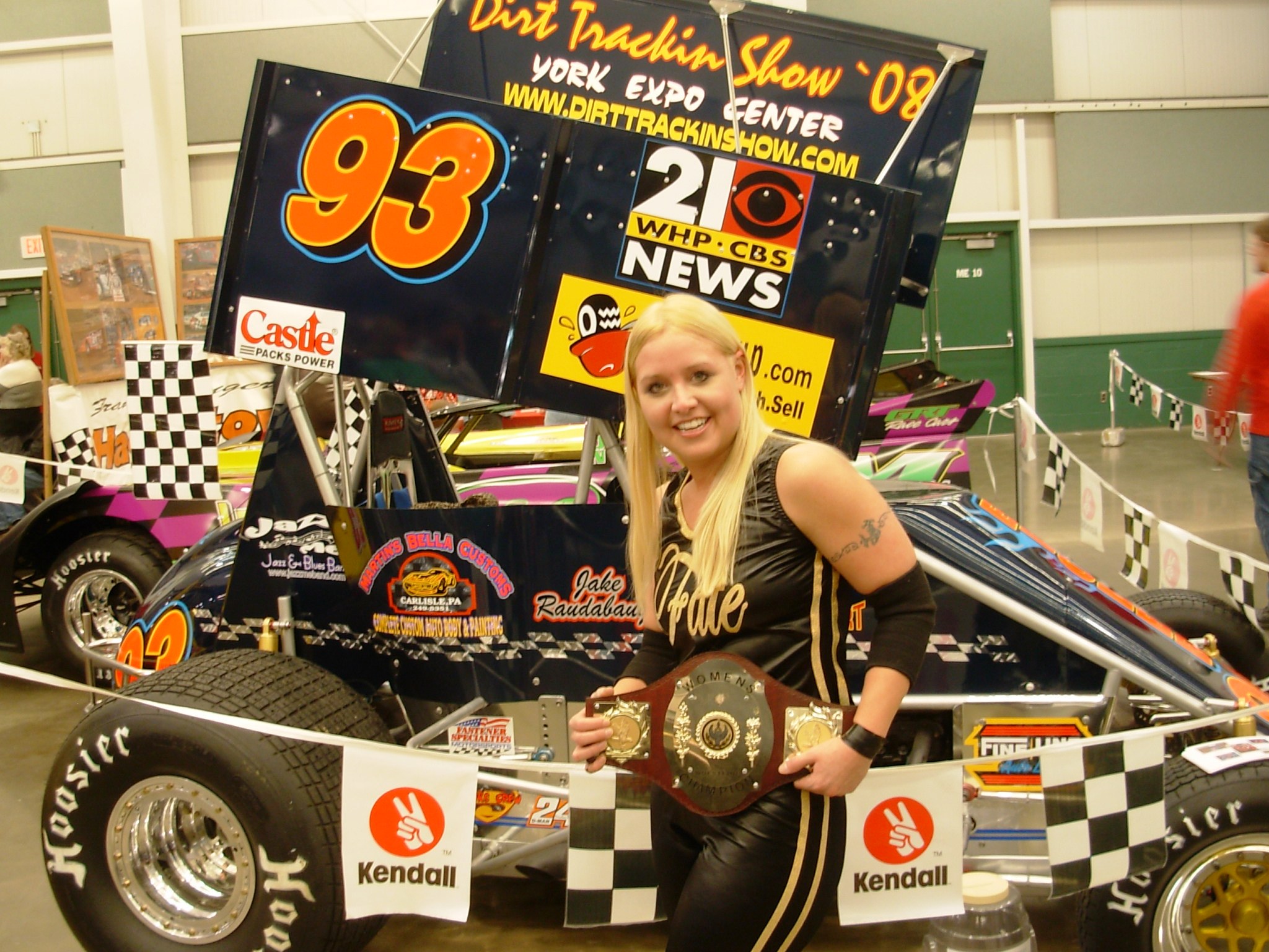 Lady wrestler Fate checks out Jake the Snake's ride for 2008
