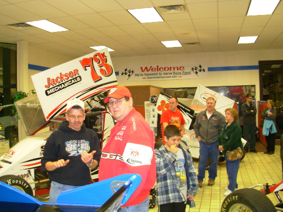 Fans everywhere checking out the cars...
