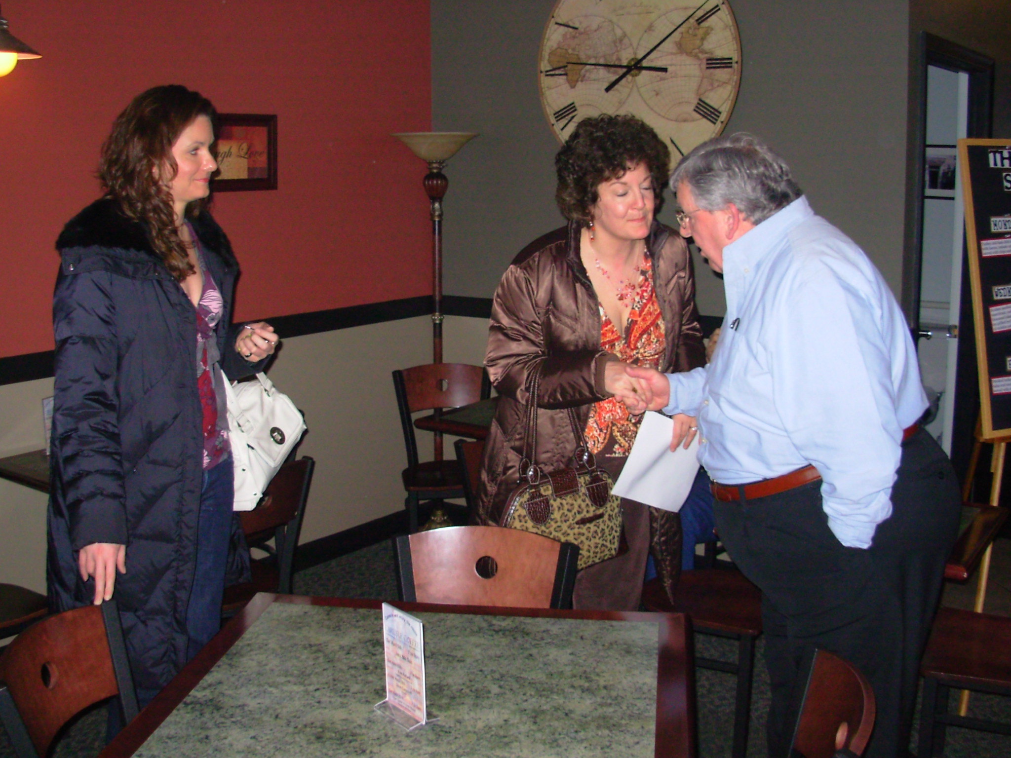 Well wishers being greeted by the owner of the Carlisle Coffee Company
