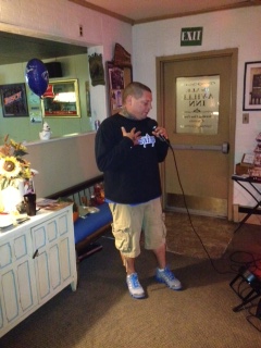 JP co-owner of the Aville Inn singing with the Band
