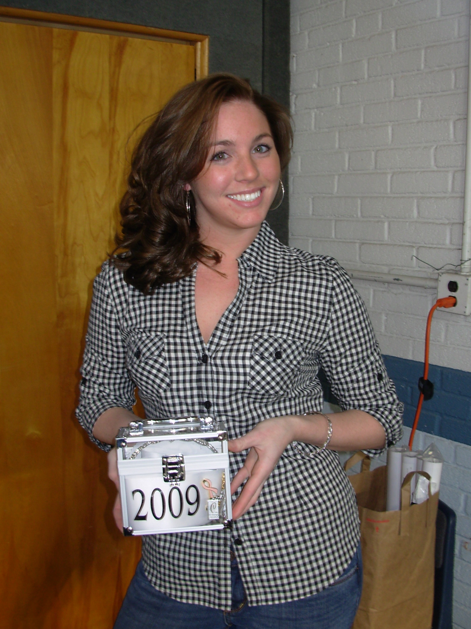 Loralynn and her checkered flag gear box
